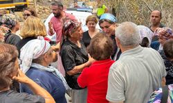 Ersin, yangında evleri zarar görenlerle bir araya geldi