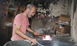Hem kalaycı hem şair