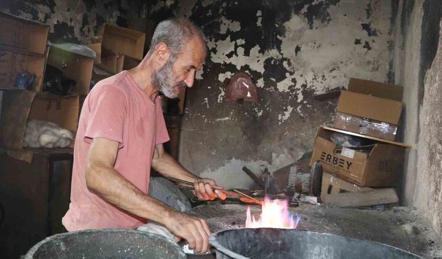 Hem kalaycı hem şair